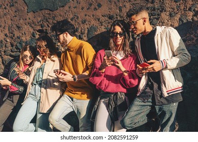 Gen Z Friends Carefree Talking And Browsing Social Media Contention The Smartphones - Young People Sharing Internet Contents Outdoors