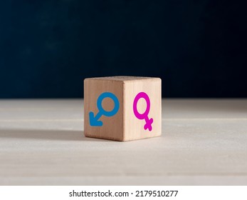 Gender Difference, Identity And Equality Concept. Male And Female Gender Symbols On Wooden Cube.