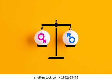 Gender Equality Concept. Male And Female Gender Sex Symbols Are In Balance On A Scale On Yellow Background. 