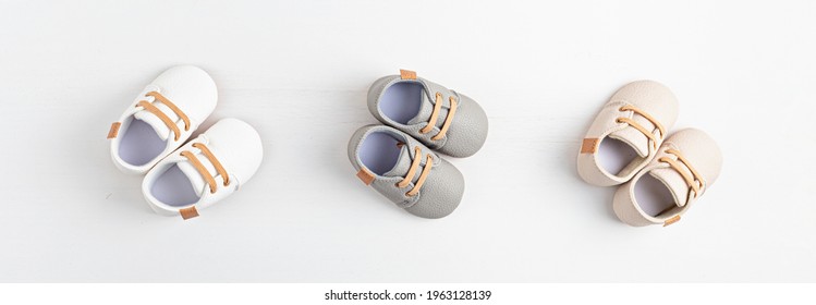 Gender Neutral Baby Shoes. Banner. Baby Shower Invitation, Greeting Card