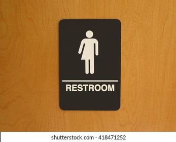 Gender Neutral Bathroom Sign On Door