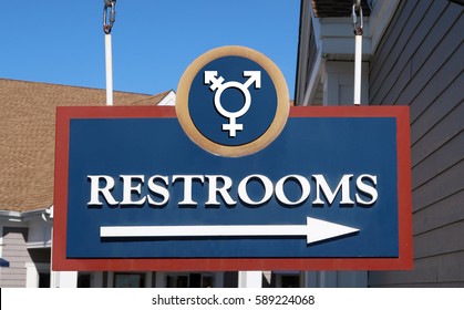 Gender Neutral Bathroom Sign That Says, RESTROOMS.                               