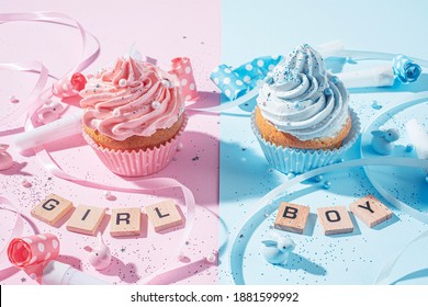 gender party. boy or girl. two cupcakes with blue and pink cream, celebration concept when the gender of the child becomes known - Shutterstock ID 1881599992