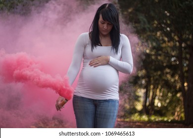 Gender Reveal Announcement By Pregnant Woman With Pink Smoke Bomb