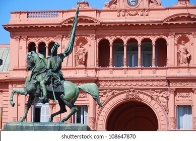 General Belgrano monument in front of Casa Rosada (pink house) Buenos Aires Argentina.La Casa Rosada is the official seat of the executive branch of the government of Argentina. - Shutterstock ID 108647870