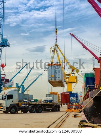 General cargo shipments in the port terminal are working busy congestion in yard of the port, the loading discharging bulk and steel shipment are in logistics transports of the sea and land meet toget