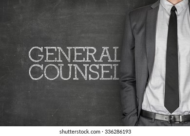 General Counsel On Blackboard With Businessman In A Suit On Side