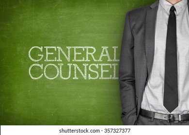 General Counsel On Blackboard With Businessman In A Suit On Side