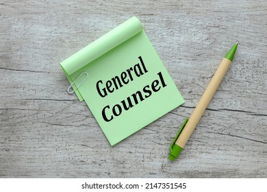 General Counsel. Text On Green Sticky Note On Wooden Table