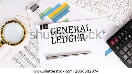 GENERAL LEDGER text on the white paper on light background with charts paper ,keyboard and calculator