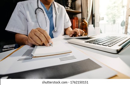 General Medical Services (GMS) and general practitioners (GPs or family physicians). Successful diagrams. Smart doctors make report notes (COVID-19). - Shutterstock ID 1762150151