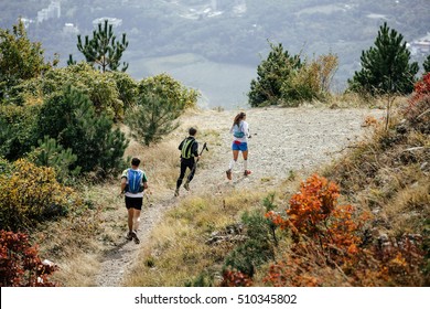 General Plan Group Of Runners Running One Behind Another During Mountain Marathon Of Autumn Three