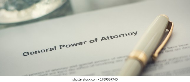 A general power of attorney on the desk. Pen on the table. Vintage style.