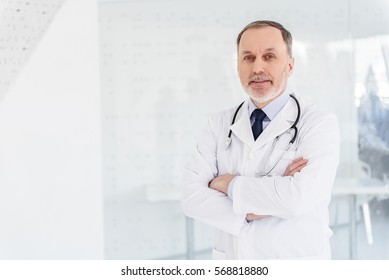 General Practitioner Working In Clinic