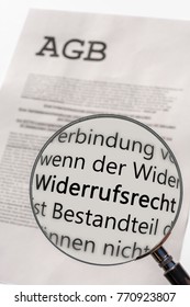General terms and conditions are examined with the magnifying glass with the German word for revocation