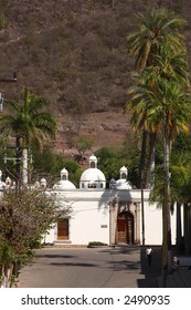 general view of the front side of a colonial house at the foothill in the town of Alamos in the northern state of Sonora, Mexico, Latin America