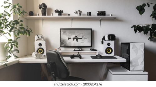 General view home workplace of gamer with computer and gamepad.  - Shutterstock ID 2033204276