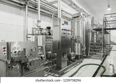 General View Of The Interior Of A Milk Factory. Equipment At The Dairy Plant