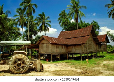 General View Of A Minangkabau Style Traditional Malay Abandoned  House At Jempol Negeri Sembilan Malaysia. Image Taken On August 4 2007.