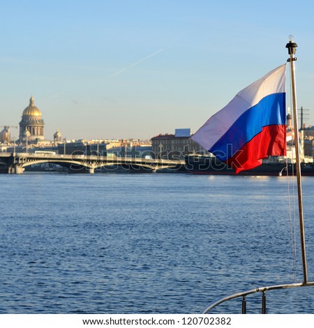 General view on Saint-Petersburg embankment and russian flag