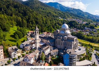 General View Of Picturesque Re Village In Green Italian Alps In Sunny Summer Day Looking Out Over Pilgrimage Sanctuary Of Madonna Del Sangue