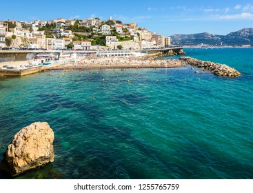 General View Of The Prophet Beach In Marseille, France, A Very Popular Family Beach Located On The Kennedy Corniche, On A Hot And Sunny Spring Day.