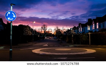 General View of the UK Roundabout, residential area in the evening, houses present