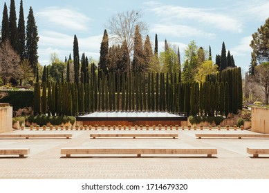 Generalife amphitheater in Granada for outdoor theater and cypress trees.