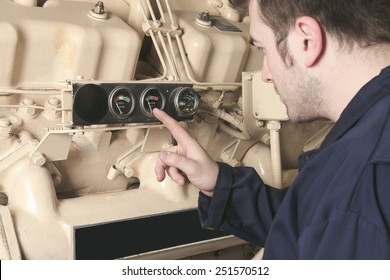 A Generator  In A Hospital With A Repair Men.