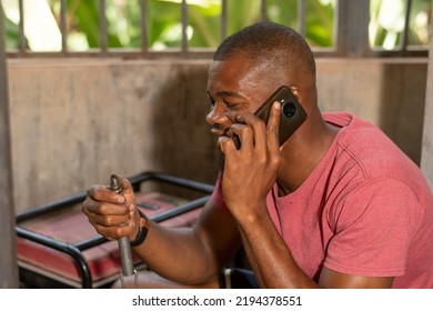 Generator Repair Man Making A Phone Call