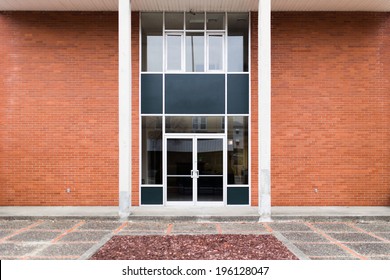 Generic Brick Office Building Front Entrance With Glass Doors, No Signage