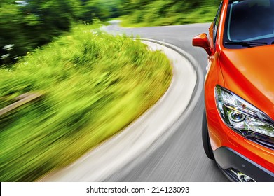 Generic Car Driving On A Winding Road