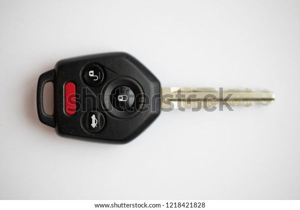 Generic\
electronic car key on a white\
background