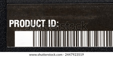 A generic empty blank product ID identification number value sticker label placeholder mockup with a barcode and place for text electronic devices store inventory, factory manufacturing series concept