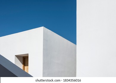 Generic Geometric Minimalist White Architecture On A Clear Sunny Day.