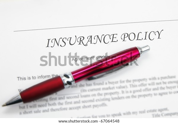 generic insurance policy with pen; could be life,
auto, health etc