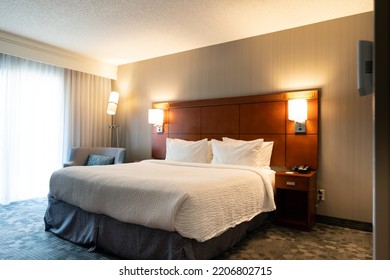 Generic King Size Bed Hotel Room Interior