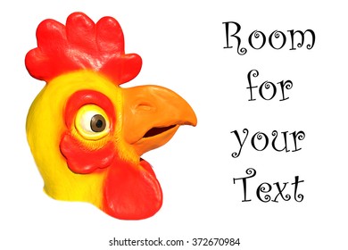 Generic Rubber Yellow And Red Chicken Head Mask. Isolated On White With Room For Your Text.