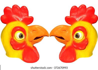 Generic Rubber Yellow And Red Chicken Head Mask. Isolated On White With Room For Your Text.