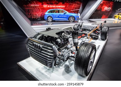GENEVA - MARCH 3, 2015: Audi Q7 E-Tron Quattro diesel-electric SUV presented at the 85th Geneva International Motor Show in Palexpo. Photo of the platform with hybrid powertrain.