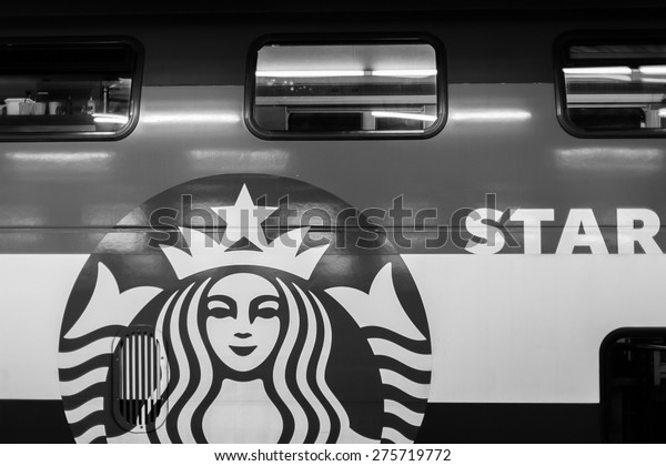 GENEVA - SEP\
15: Starbucks cafe train coach on September 15, 2014 in Geneva,\
Switzerland. Starbucks is the largest coffeehouse company in the\
world, with more then 23000\
stores