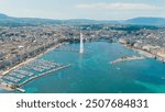 Geneva, Switzerland. Fountain Je-Deau. Large fountain jet up to 140 meters. The main attraction of Lake Geneva. Summer day, Aerial View  