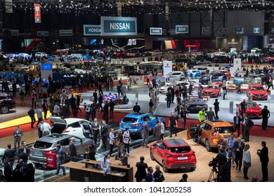 GENEVA, SWITZERLAND - MAR 6, 2018: Visitors and cars at the 88th Geneva International Motor Show.