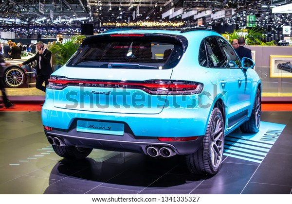 Geneva,\
Switzerland, March 05, 2019: all new blue Porsche Macan S 2019\
model at Geneva International Motor Show, five-door luxury\
crossover utility vehicle CUV produced by\
Porsche