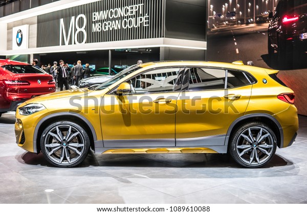 Geneva, Switzerland, March 06, 2018: metallic gold BMW\
X2 at 88th Geneva International Motor Show GIMS, manufactured and\
marketed by BMW 