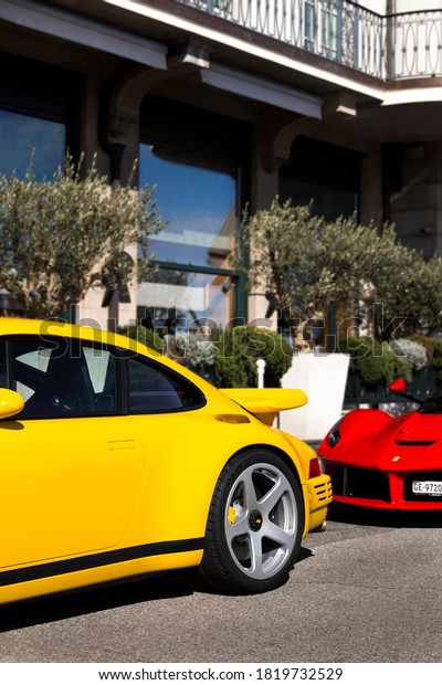 Geneva, Switzerland -\
March 2018: Ruf CTR 2017 sports car parked by a luxury hotel in\
central Geneva. The car, based on a classic Porsche 911, is a\
unique luxury project.