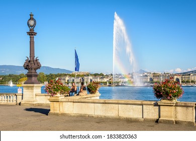 Geneva, Switzerland - September 8, 2020: View over the bay of Geneva and the Jet d'Eau water jet fountain from the Mont Blanc rotunda, a public square on the right bank of the Lake Geneva.
