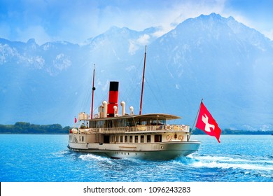 Geneve Lake Leman Geneva paddle steamer ship Switzerland with Swiss flag
