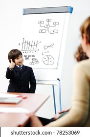 Genius Kid On Business Presentation Speaking To Adults And Giving Them A Lecture