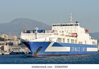 GENOA, ITALY - NOVEMBER 2, 2015: Eurocargo Malta Is A RoRo Ferry Cargo Company Inarme The Grimaldi Group, Built In Hyundai Mipo Shipyard In Ulsan, South Korea. The Ship Enters The Port.  